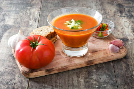 Traditional Spanish cold gazpacho soup on wooden tableの写真素材