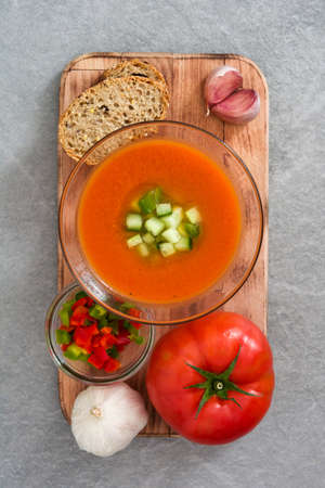 Traditional Spanish cold gazpacho soup on gray stone.の写真素材