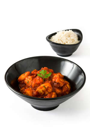 Chicken tikka masala in bowl isolated on white backgroundの写真素材
