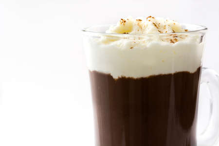 Irish coffee in glass isolated on white backgroundの写真素材