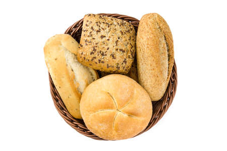 Mixed bread in basket isolated on white background.Top viewの写真素材
