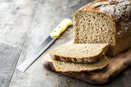 Rustic bread on wooden table
