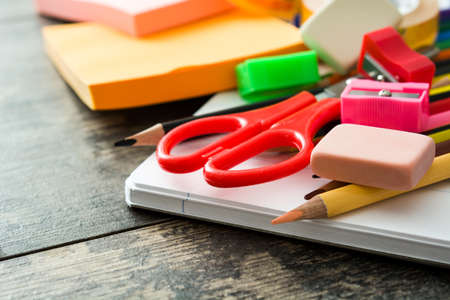 School supplies on wooden background. Back to school concept. Copyspace.の写真素材