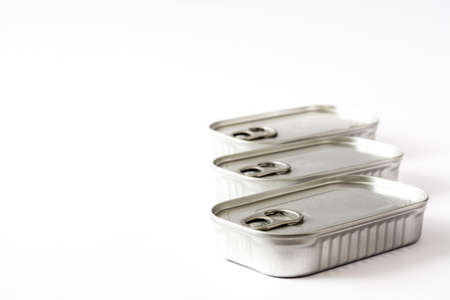 Closed cans of preserves isolated on white backgroundの写真素材