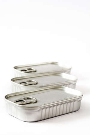 Closed cans of preserves isolated on white backgroundの写真素材