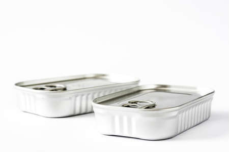 Closed cans of preserves isolated on white backgroundの写真素材