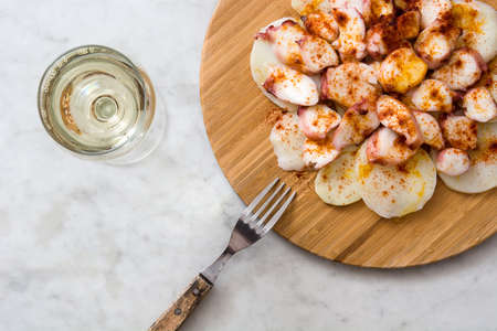 Octopus a la Gallega. Galician octopus on white marble. Typical spanish foodの写真素材