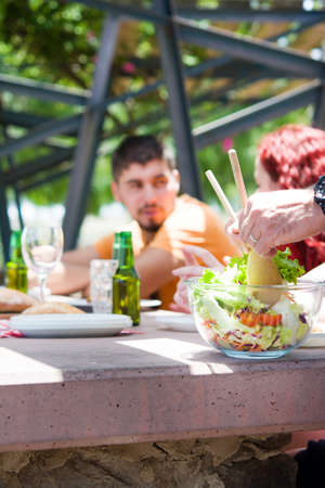 Friends enjoying picnic dayの写真素材