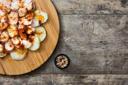 Octopus a la Gallega. Galician octopus on wood. Typical spanish foodの写真素材