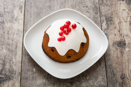 Christmas pudding on wooden tableの写真素材