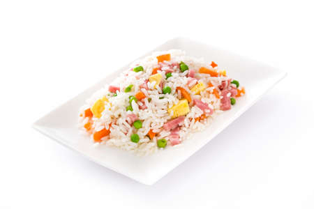 Chinese fried rice with vegetables and omelette isolated on white backgroundの写真素材