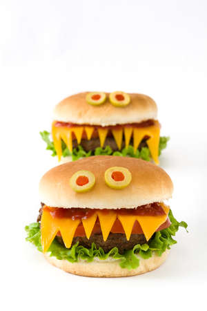 Halloween burger monsters isolated on white backgroundの写真素材