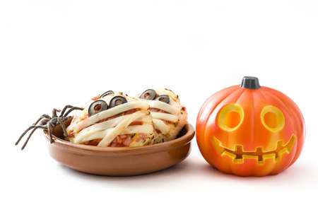 Halloween pumpkin pizzas and halloween pumpkin isolated on white backgroundの写真素材