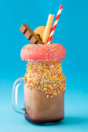 Extreme milkshake or freak shake on blueの写真素材