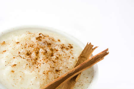 Rice pudding. Rice pudding with cinnamon isolated on whiteの写真素材
