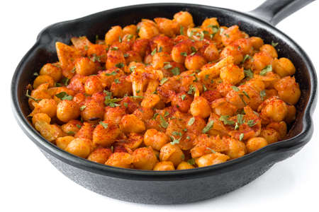 Fried spicy chickpeas in frying pan isolated on white backgroundの写真素材