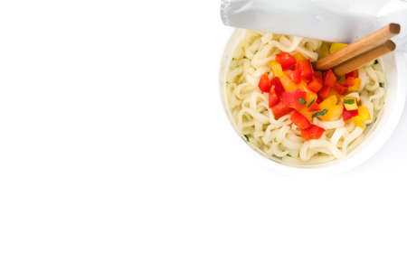 Take away noodles with vegetables isolated on white background. Top view Copyspaceの写真素材
