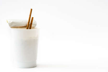 Take away noodles with vegetables isolated on white background. Copyspaceの写真素材