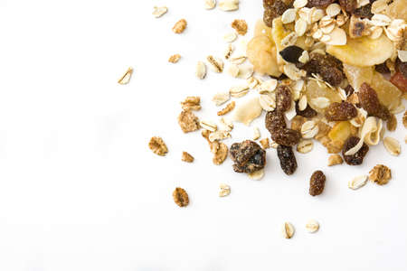 Muesli and dried fruit isolated on white background. Top view Copyspaceの写真素材