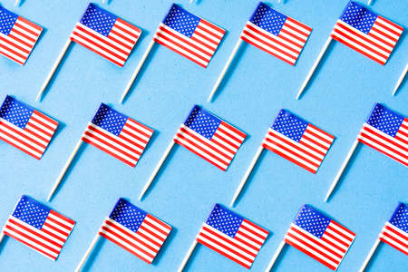 USA flags pattern on blue backgroundの写真素材