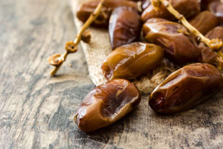 dates food on wooden table.