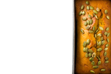 Homemade pumpkin bread isolated on white background. Top view Copyspace