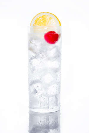 Classic Tom Collins cocktail on white backgroundの写真素材