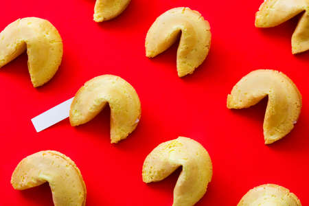 Fortune cookies pattern on red backgroundの写真素材