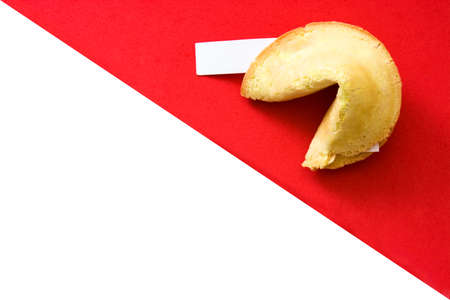 Fortune cookies on white and red backgroundの写真素材