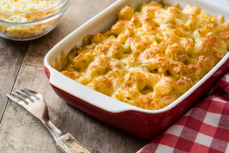 Typical American macaroni and cheese on wooden tableの写真素材
