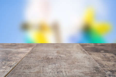 Wooden table and blur landscape background