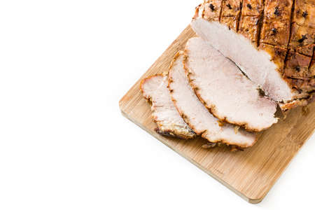 Traditional homemade honey Glazed Ham for holidays isolated on white background. Copyspaceの写真素材