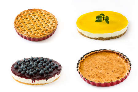 Pie and cake collage. Lemon pie, blueberry cheesecake, pumpkin pie and apple pie isolated on white backgroundの写真素材