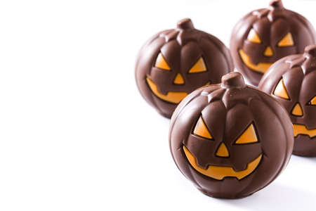 Chocolate Halloween pumpkins isolated on white background.の写真素材