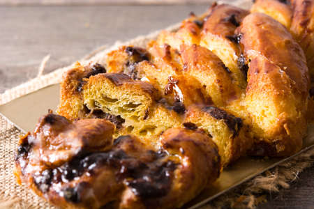 Homemade braid chocolate on wooden table. Close upの写真素材