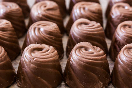 pieces of chocolate bonbons backgroundの写真素材