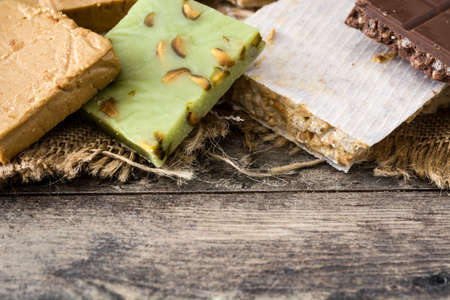 Christmas nougat on wooden table. Top view. Copyspace