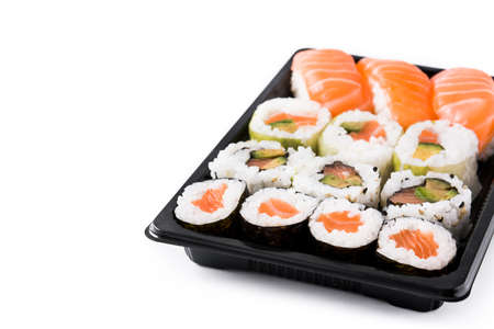 sushi assortment on black tray isolated on white background. Copyspaceの写真素材