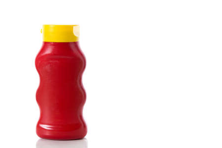 Ketchup bottle mockup isolated on white background. Copyspaceの写真素材