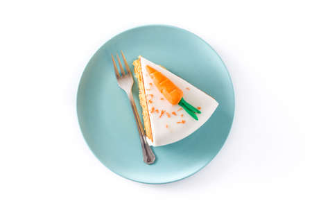 Sweet carrot cake slice isolated on white background. Top view