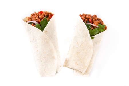 Typical Mexican burritos wraps with beef, beans and vegetables isolated on white background. Top viewの写真素材