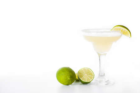 Margarita cocktail with lime in glass isolated on white background. Copyspaceの写真素材