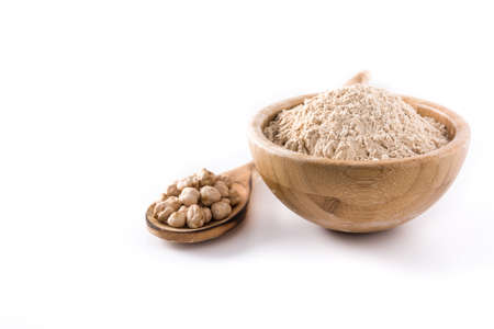 Chickpea flour in wooden bowl isolated on white background. Copyspaceの写真素材