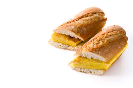 Spanish tortilla sandwich. Spanish potato omelette sandwich isolated on white background. Copyspace