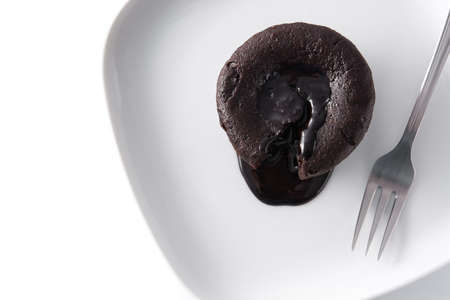 Coulant chocolate cake isolated on white background. Top view