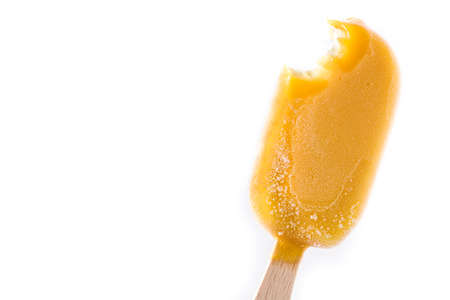Orange ice lolly isolated on white background. Copyspaceの写真素材