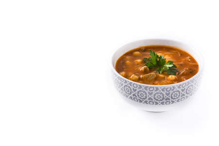 Harira soup in bowl isolated on white background. Typical Moroccan food. Ramadan concept.Copyspace