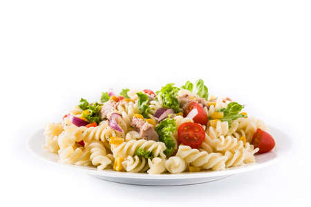 Pasta salad with vegetables isolated on white backgroundの写真素材