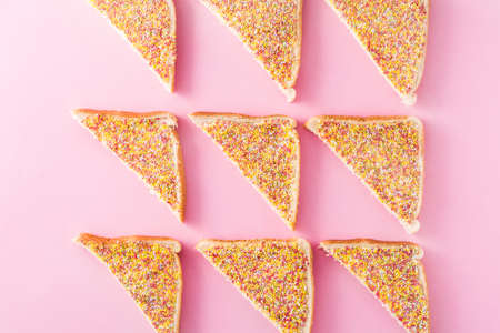 Traditional Australian fairy bread on pink backgroundの写真素材