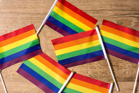 LGTB or rainbow flag. Gay pride flag on wooden table.